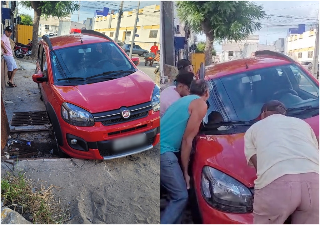 Carro cai em “boca de lobo” no Centro de Patos neste sábado (10). Populares fazem resgate a mão. VÍDEO