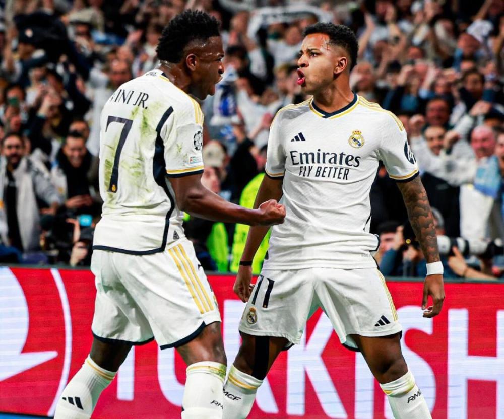 Em jogo 'antológico' no Bernabéu, Vinicius Jr. dá 2 assistências, Real Madrid supera golaços do City e arranca empate na Champions