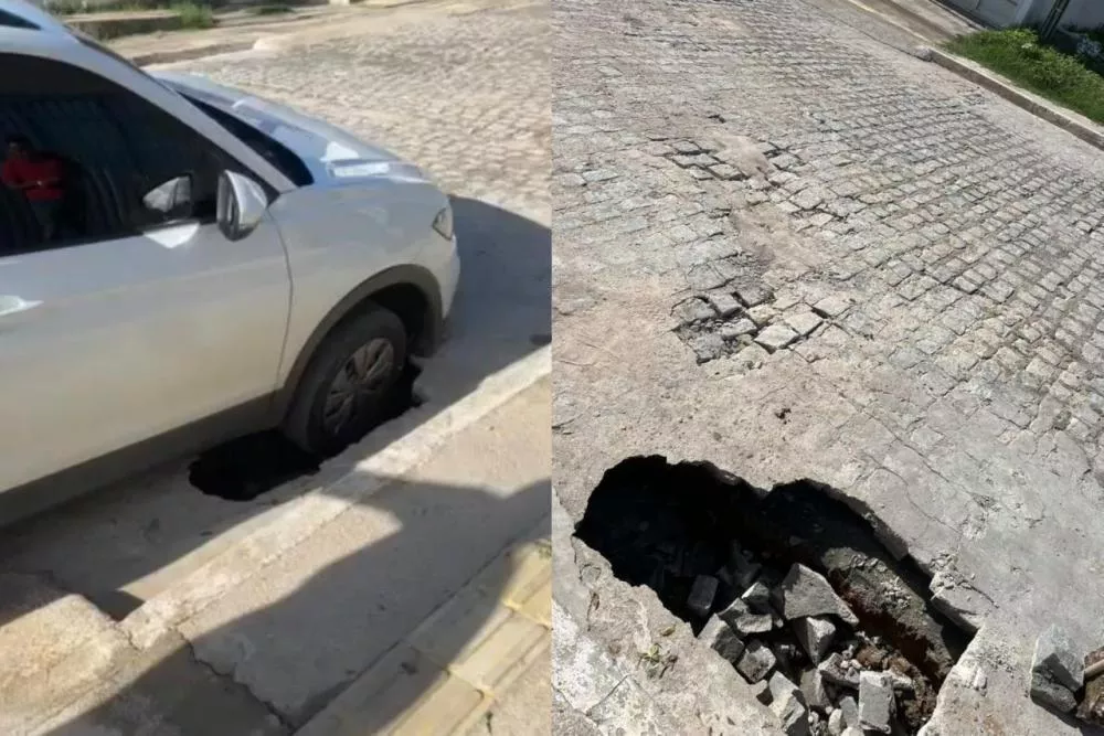 Carro fica preso em buraco após galeria ceder em rua do bairro São Sebastião, em Patos; veja o vídeo